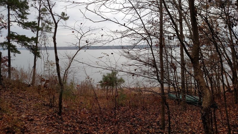 View of Falls Lake after making a sharp right turn on MST past 2 houses