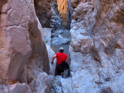 Crawling through the slit in Slit Canyon