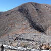 Saddle in the foreground is the intersection of the Rendija Ridge trail with the Mitchell Trail #69 looking west.