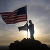 View of the flags on the summit of Mother Miguel Mountain at sunset