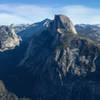 Half Dome from Glacier Point. Grizzly Peak, Mount Broderick, Liberty Cap, and Nevada Falls on the right. North Dome, Basket Dome, Washington Column, and Royal Arches on the left.