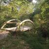 Footbridge with arches along the northeast to northwest trail in Hickory Hill Park.