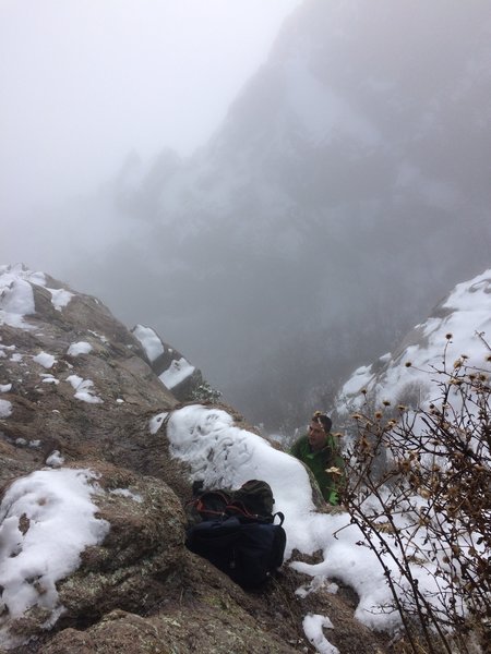 Looking down from the diagonal seam climb approaching the peak.