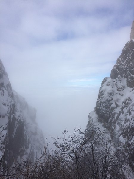 A cloudy view from the top of Dark Canyon - the narrow canyon only gets a few hours of sunlight each day, hence the name.