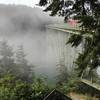 Fog swallowing Deception Pass Bridge.