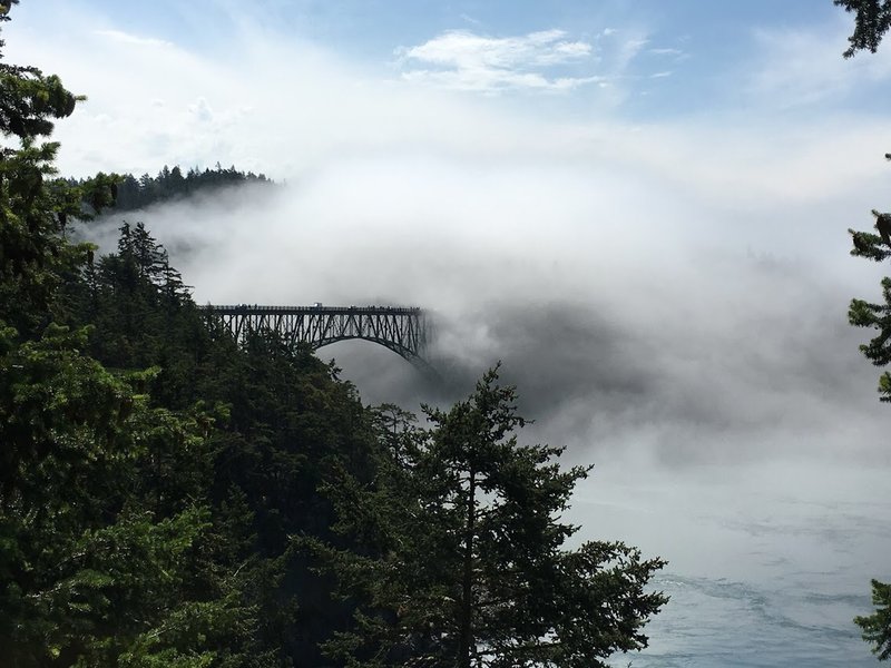 Fog rolling over Deception Pass Bridge.