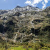 Standing in awe in front of 2,000 feet of mountain wall covered with so many small waterfalls