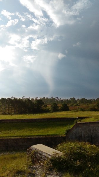 End of a water spout near Battery Cooper from Fort Pickens