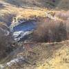 The creek is rather small but the banks on either side are steep and can be muddy