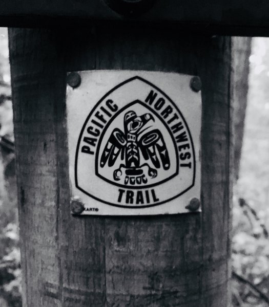 Pacific Northwest Trail marker, at the base of Goose Rock.