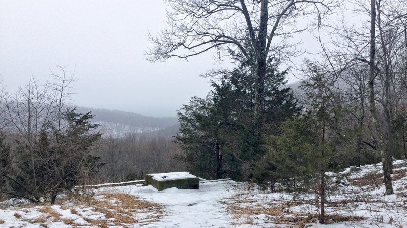 Ruins of an old cabin and view.