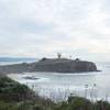 Pillar Point Air Force Station sits off in the distance above the Pacific.