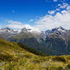 View across the Hollyford Valley onto the snowy mountain ridge