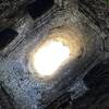 Looking up the lime kiln chimney. Note the four holes on the side if the walls.