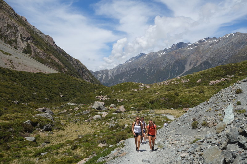 Hikers approaching the end of the Hooker Valley Track