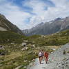 Hikers approaching the end of the Hooker Valley Track