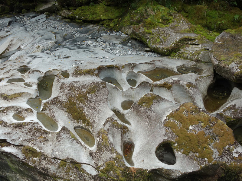 Diorite stone pockets at The Chasm scraped out by swirling pebbles