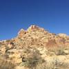 View west of some of the rocky terrain that you'll pass.