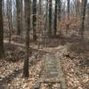 Wooden bridge before having to make a left turn