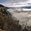 The fog is beginning to lift along side these craggy ledges in Cliff Park, Pennsylvania