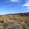 Zabriskie Point in Death Valley National Park with a daylight moon - life doesn't bet much better than this.