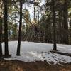 You're first "cool" site, a massive teepee draped with Nepalese prayer flags, take a look inside and trek forward!