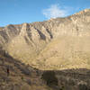 Hiker and Pine Spring Canyon from Guadalupe Mountains National Park, Guadalupe Peak Trail.