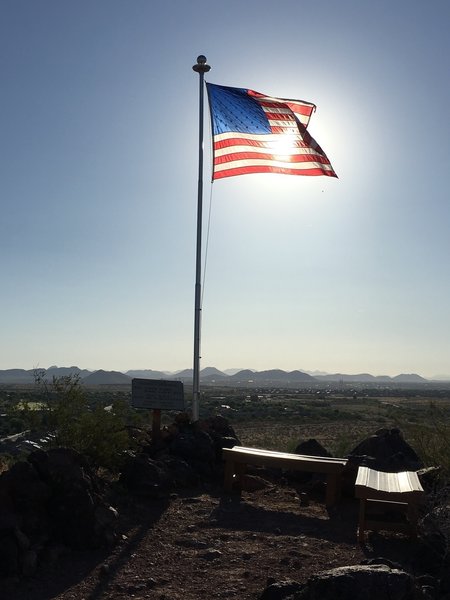 A flag pole, bench and guestbook gives hikers a place to reflect on the sacrifices of our veterans.