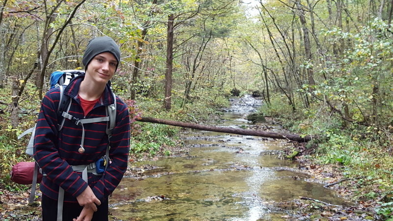 Crossing Brushy Creek on an October hike.