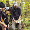 Checking the map on an October hike.