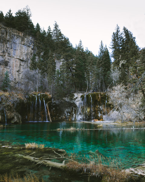 Hanging lake in November, the water is still perfectly clear and the air is crisp.