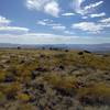 A better example of what much of the trail is like. No fast going since the rocks are hiding to trip you up. Neat views to the southeast though.