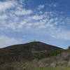 Black Mountain, framed by clouds, viewed from the start of the Nighthawk Trail