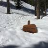 Late April snow nearly buried the sign at the beginning of the trail.