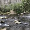 First real crossing. Just wanted to give an idea of what to prepare for. I'm 5'10" and it was right at knee deep. Keep your crocs on for the maybe the next mile. Several rock hops and one more knee deep ford.