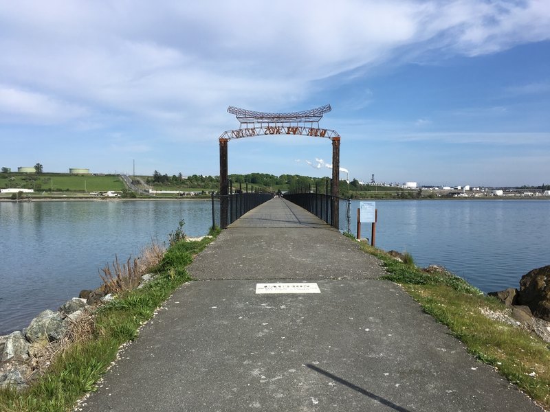 A sign over the bridge section that reads 'We' in several different languages.