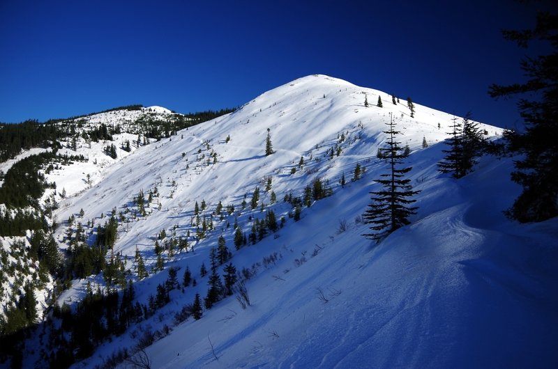 The peak with the Silver Star Indian Pits in the foreground, with Silver Star on the horizon