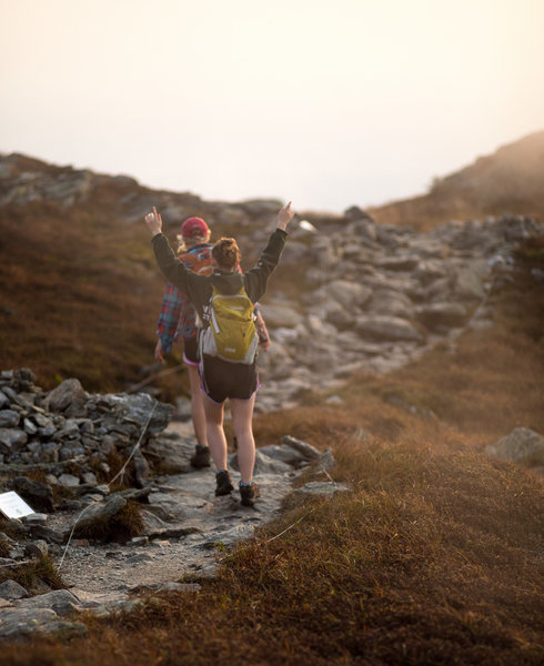 Trekking across Mount Mansfield's summit.