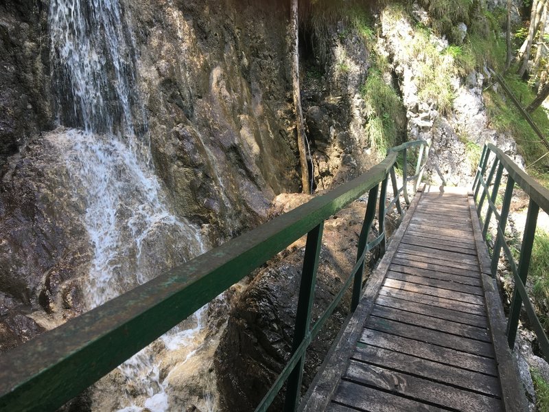 Crossing bridge over the waterfall