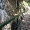 Crossing bridge over the waterfall