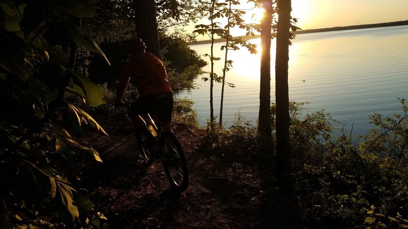 I usually run with a riding partner so he ends up in many pictures. Another view of the lake at sunset