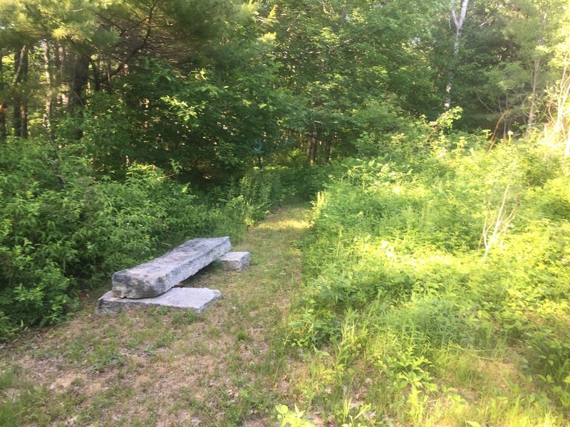 Take a break on this foundation stone bench seat