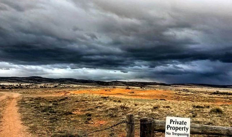 Pilot Hill looms under stormy skies