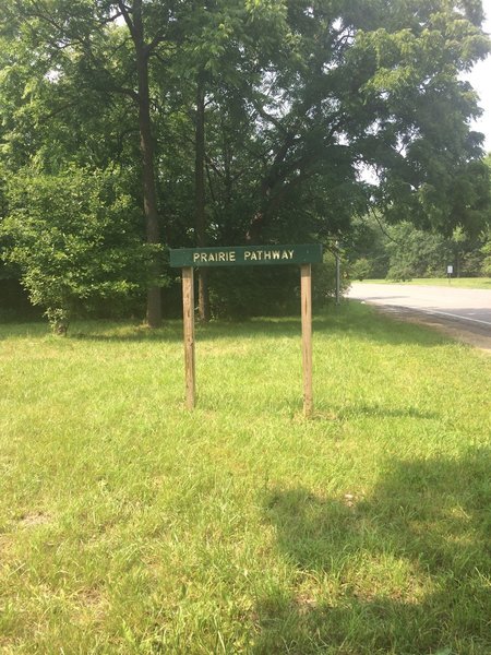 Prairie Pathway sign along Outer Drive by the trailhead.