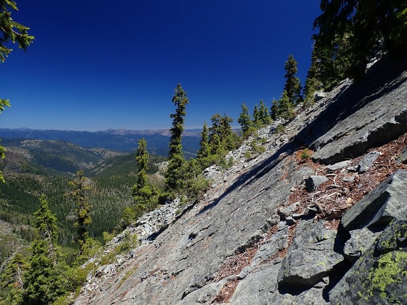 Traversing rock slabs on the way up Preston