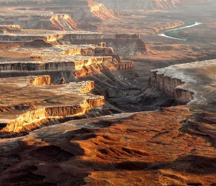 Sunset looking into the ominous looking depths of White Rim in Canyonlands National Park. If you look closely, you can see White Rim Road along the edge of the canyon.