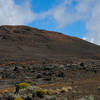 Piton Chisny's reds and browns look great against the blue sky in this martian landscape