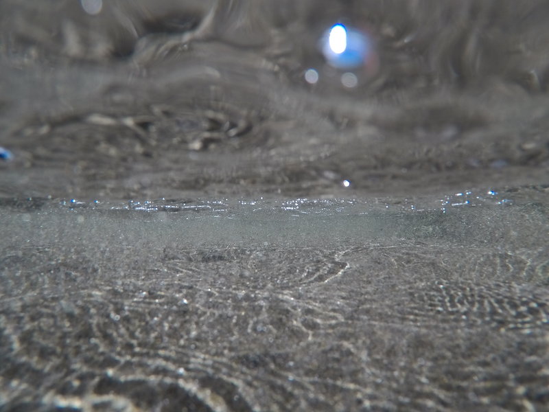 A photo under a wave that just rolled in.