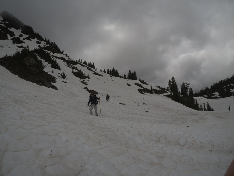 Hiking along the road, which is thoroughly covered in snow.