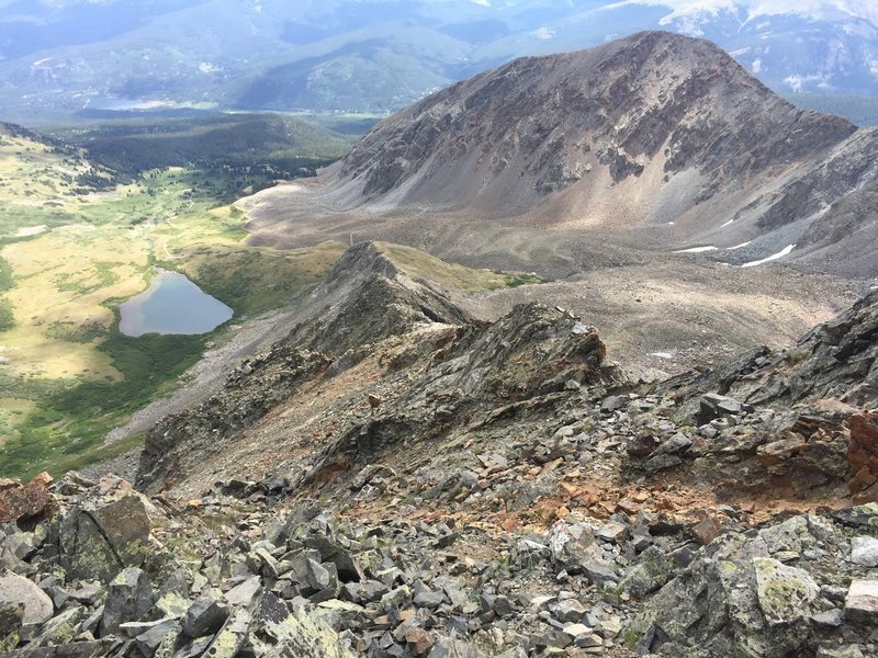 Nearing the summit of Father Dyer Peak looking down at lower crystal lake and the 3rd class ridge